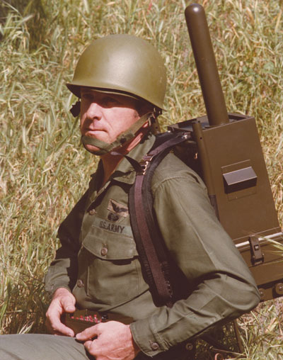 EARLY GPS MANPACK worn by JPO Army deputy Lt. Col. Paul Weber. This photo graced the cover of the first-ever GPS brochure! (Credit: Bradford W. Parkinson and Stephen T. Powers)