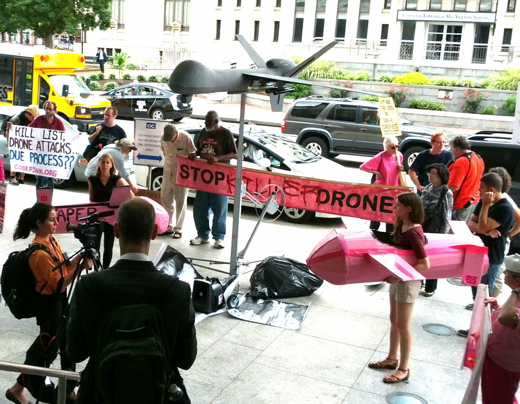 Anti-drone strike protesters outside the AUVSI Conference.