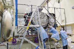 The first Galileo Full Operational Capability (FOC) satellite, FM1, seen beside the Phenix test chamber being readied for its five-week long thermal vacuum testing in October 2013. 