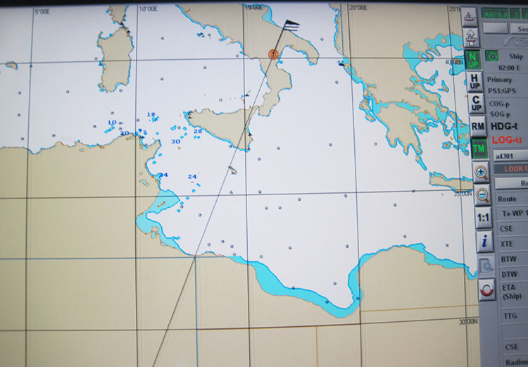 Figure 9b. The ship’s bridge GPS receiver display (Figure 9a) and its GPS-driven chart at two separate times during the Libya spoofing scenario.