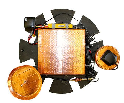 The APNT payload prior to installation of the DME antenna. The copper shielding on the CPU and antennas can be clearly seen.
