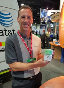 GSI Labs' John Martin holds indoor beacon at APCO.