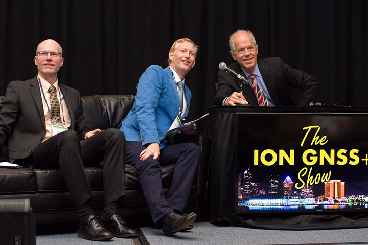 Alan Cameron, GPS World editor and publisher, interviews Technical Chair Paul McBurney following his lightning presentation. At left is Program Chair Gary McGraw.