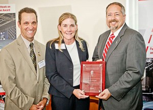 (From left) Knight, Bamford and Jaggers with the award.