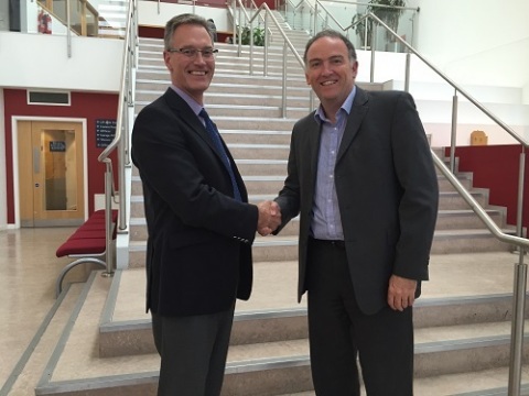 Martin Foulger (left), general manager at Spirent Communications, meets with Mark Dumville, general Manager of NSL, at NSL's headquarters in Nottingham, UK. (Photo: Spirent)