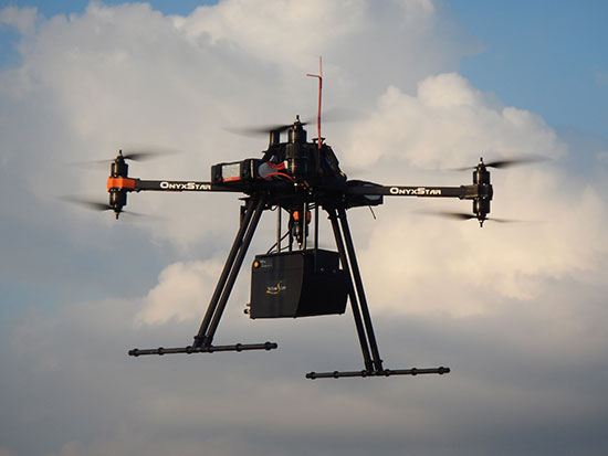 A UAV carries the YellowScan lidar.