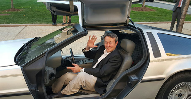 Wireless LBS Contributing Editor Kevin Dennehy sits in Delorean connected vehicle on "Back to the Future Day" sponsored by ITS America.
