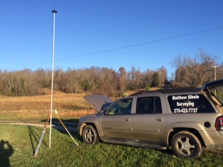 Figure 1. My TRIUMPH 2 base mounted above my driver-side door on the roof, with my 35-watt radio and antenna just to the left.