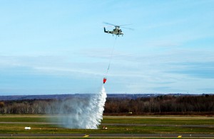 The Stalker UAS directs the unmanned K-MAX cargo helicopter to conduct water drops at a precise location to extinguish a fire. (Photo: Lockheed Martin)