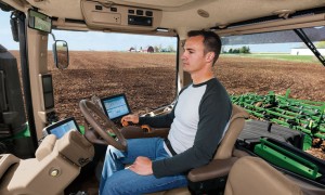 Hands-free driving: Ag companies take the wheel. (Photo: John Deere).
