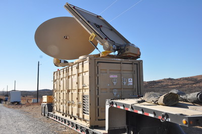 The directed energy system emits an adjustable energy beam that, when aimed at airborne targets such as drones, renders them unable to fly. (Photo: PRNewsfoto/Raytheon Company)