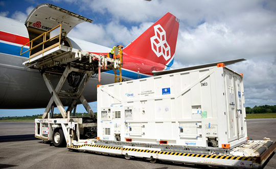 One of the two Galileo satellites 25 and 26 is unloaded from a Boeing 747 cargo jet at Cayenne – Félix Eboué Airport in French Guiana on June 1. The satellites travel inside protective air-conditioned containers. (Photo: ESA)