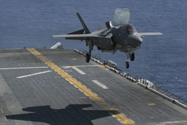 An F-35B Lightning II prepares to land on the flight deck of the USS Wasp while underway in the Philippine Sea, March 23, 2018. (Photo: U.S. Marine Corps/Lance Cpl. Amy Phan)