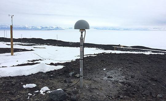 FIGURE 3. The antenna of IGS station ARHT at McMurdo Station, Antarctica. (Photo: IGS)