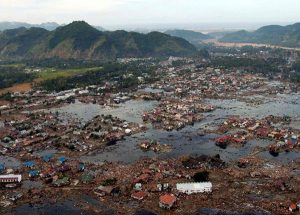 Indian Ocean (Jan. 2, 2005): A village near the coast of Sumatra lays in ruin after the Tsunami that struck South East Asia. (Photo: U.S. Navy/Photographer's Mate 2nd Class Philip A. McDaniel)