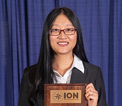 The Institute of Navigation presents Yu Jiao with the Parkinson Award at ION GNSS+ 2018. (Photo: ION)