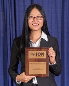 The Institute of Navigation presents Yu Jiao with the Parkinson Award at ION GNSS+ 2018. (Photo: ION)