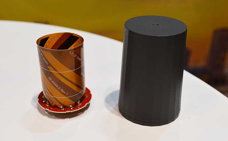 The new helical antenna in both housed (right) and unhoused form. (Photo: Allison Barwacz)