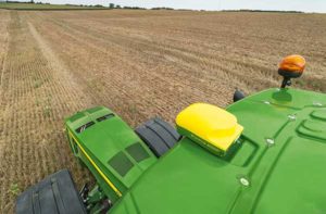 The John Deere StarFire 6000 RTK receiver operating in the field. (Photo: John Deere)