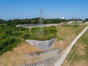 A transmission tower complicates construction. (Photo: Trimble)