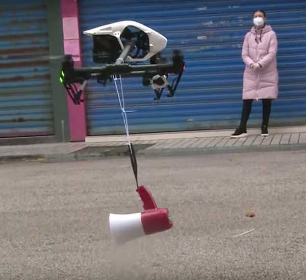 Drone with megaphone. (Screenshot: Xinhuanet video)