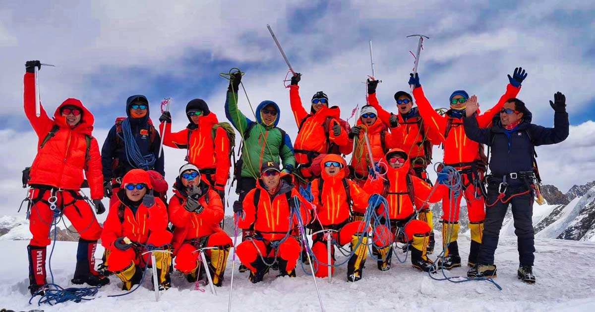 The survey team and sherpas reach the top of the world. (Photo: CHC Navigation)