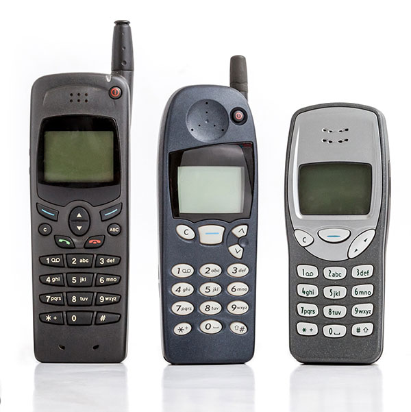 Can you hear me now? A sampling of early cell phones. (Photo: yktr/iStock/Getty Images Plus/Getty Images)