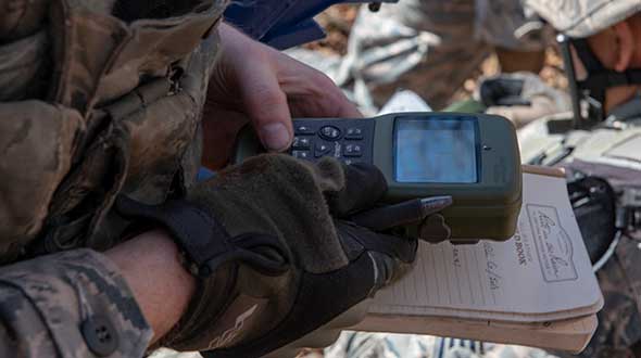 An Airman with the 374th Security Forces Squadron uses a Defense Advanced GPS Receiver (DAGR) to track the team’s current during a 2018 field training exercise at Camp Fuji, Japan. (Photo: Senior Airman Matthew Gilmore/U.S. Air Force)
