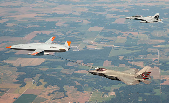 Boeing’s MQ-25 T1 test asset transfers fuel to a U.S. Navy F-35C Lightning II fighter jet Sept. 13 during a flight-test mission. The Navy and Boeing have conducted three refueling flights in the past three months, including an F/A-18 Super Hornet and E-2D Hawkeye. (Photo: US Navy/Kevin Flynn)