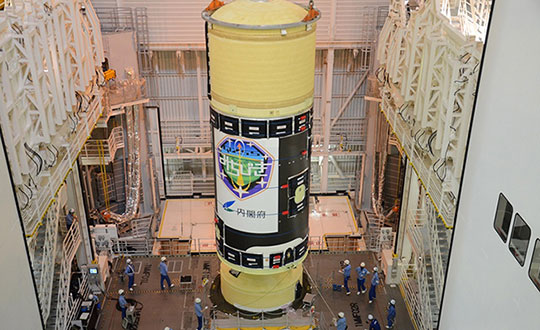 H-IIA Launch Vehicle No. 44 at the Yoshinobu Vehicle Assembly Building, JAXA Tanegashima Space Center. in preparation for launch of the successor to the Michibiki Unit 1 on Oct. 25. (Photo: MHI)