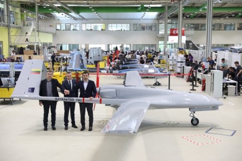 Officials with donated TB2 drone (Photo: Baykar)