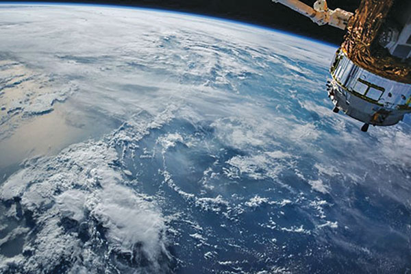 GPS relies on faint radio signals from satellites about 12,000 miles away, requiring a quiet spectrum neighborhood to operate. (Photo: NASA)