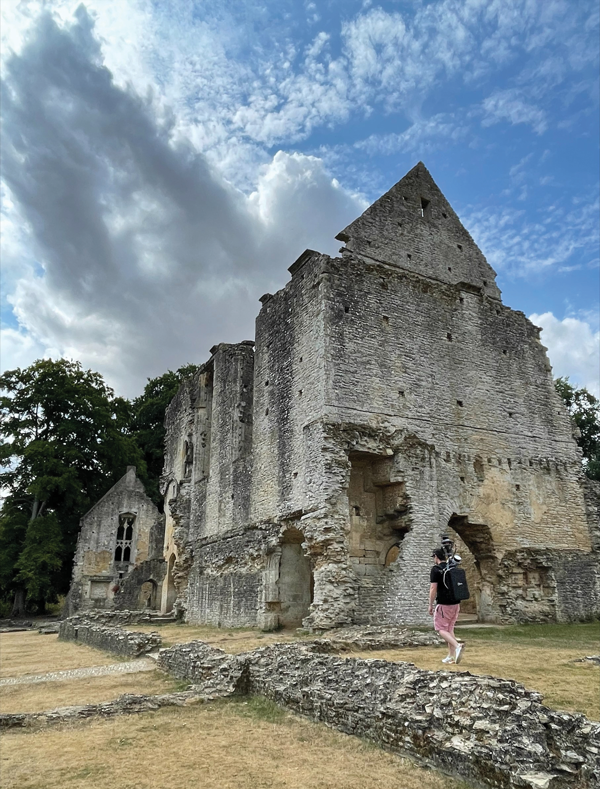 Paris Austin, head of product – New Technology for OxTS, tries out the new backpack at historic Minster Lovell Hall. (Image: OxTS)