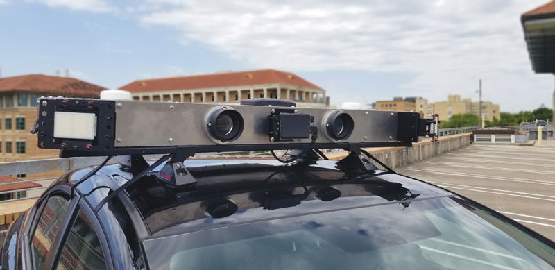 Figure 1: The UT RNL has developed a multi-modal ground-vehicle-mounted integrated perception platform call the Sensorium. It houses three different types of IMU, two triple-frequency GNSS antennas, three radar sensors and two cameras.