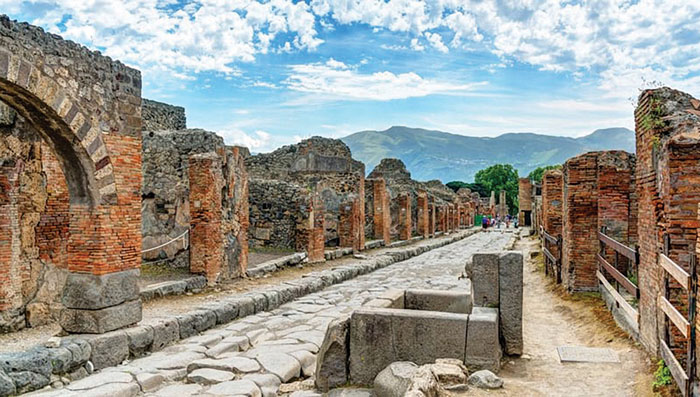 A street in Pompeii shows the structures that were remarkably preserved after Mount Vesuvius covered the city in ash in 79 CE. Everything about Porta Nocera, Region I 14 is being digitized by archaeologists. (Image: Allison Emmerson)
