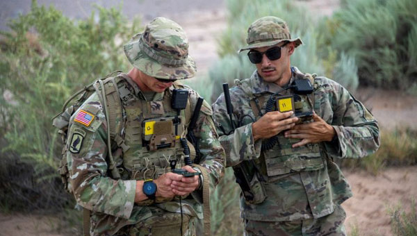 Soldiers from the 101st Airborne Division conduct at terrain walk using the Dismounted Assured Positioning System during the 2023 PNTAX. (Photo: U.S. Army)