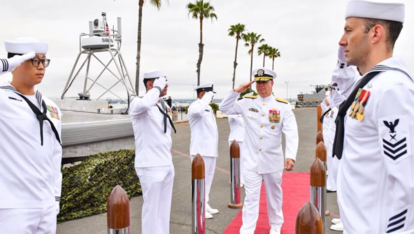 Commander, Naval Surface Force, U.S. Pacific Fleet Vice Adm. Brendan McLane is rung in upon his arrival to the establishment ceremony for Unmanned Surface Vessel Squadron 3 (USVRON 3) on Naval Amphibious Base Coronado May 17, 2024. The squadron is comprised of unmanned Global Autonomous Reconnaissance Crafts (GARCs). The 16-foot GARCs built by Maritime Applied Physics Corporation enable research, testing, and operations that will allow integration throughout the surface, expeditionary, and joint maritime forces. (Photo: U.S. Navy photo by Mass Communication Specialist 1st Class Claire M. DuBois)