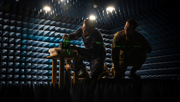 Personnel from the Australian Joint Precision Navigation and Timing Directorate, Joint Capabilities Group and Joint Navigation Warfare Center align GPS test equipment in the JNWC anechoic chamber at Kirtland Air Force Base, N.M., in preparation for a GPS resilience test April 15, 2024. This combined effort not only enhances GPS navigation resilience but also exemplifies the power of international cooperation in addressing security threats. As the world faces evolving challenges, partnerships like these remain essential for maintaining an edge in contested environments. (U.S. Air Force photo by Senior Airman Spencer Kanar)