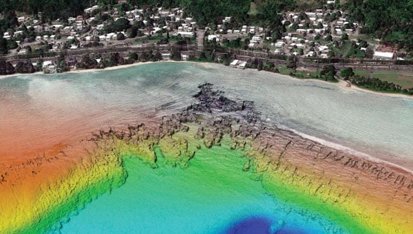 A view looking south at the Submarine Canyon on Asan Point, Guam. The image was created from the lidar bare earth model and lidar point cloud colored by elevation and RGB values from imagery respectively. (Photo: Partnership between NV5 and Woolpert)