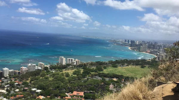 Honolulu beside a calm sea in 2017. A JPL technology recently detected and confirmed a tsunami up to 45 minutes prior to detection by tide gauges in Hawaii, and it estimated the speed of the wave to be over 580 miles per hour (260 meters per second) near the coast. (Photo: NASA/JPL-Caltech)