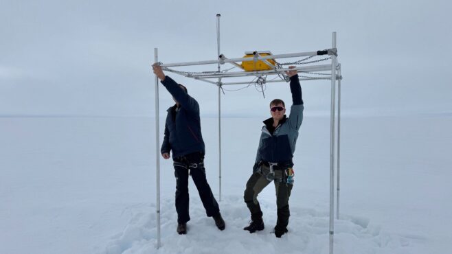 Greenland is shifting centimeters northwest each year, shows new research led by Danjal Longfors Berg (right). The island’s size also changes due to bedrock stretching and compression. (Photo: DTU Space)