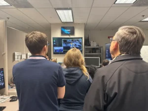 Members from NASA and Italian Space Agency watching the Blue Ghost lunar lander touch down on the Moon. (Photo: NASA )