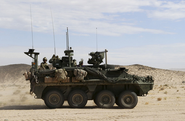 Soldiers from 2-2 Stryker Brigade Combat Team move out in their Stryker during their training rotation at the National Training Center on Fort Irwin, Calif., Sept. 2, 2019. (Photo: Sgt. Ryan Barwick/U.S. Army)