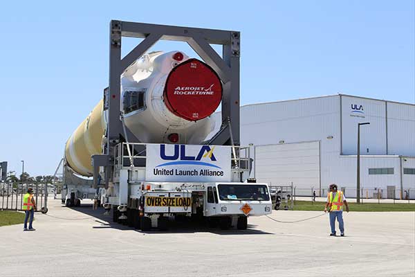 The Delta IV rocket leaves the the Horizontal Integration Facility (HIF) aboard a 36-wheel, diesel-powered transporter on May 28 and traveled to Space Launch Complex-37. The trip took 40 minutes. (Photo: ULA)