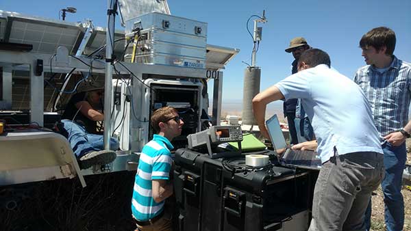 With USNO personnel, members of the 746 TS reconfigure the Master LocataLite site for the test. (Photo: 746 TS/USAF)
